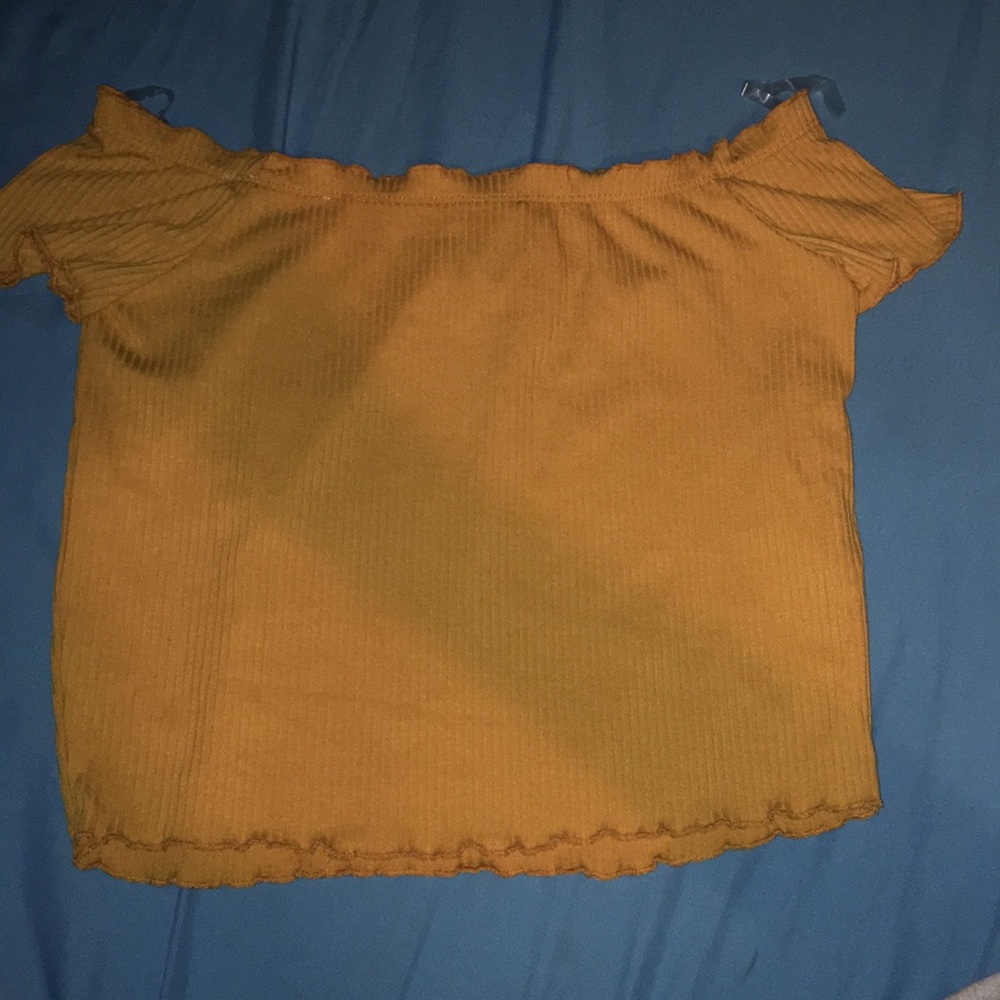 Yellow crop top.